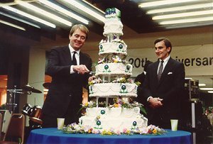 William K. Reilly and Hank Habicht cutting birthday cake at EPA's 20th Anniversary celebration