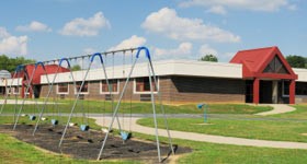 school grounds with swing set