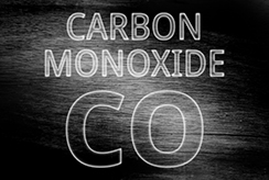 Symbol for carbon monoxide on a chalkboard