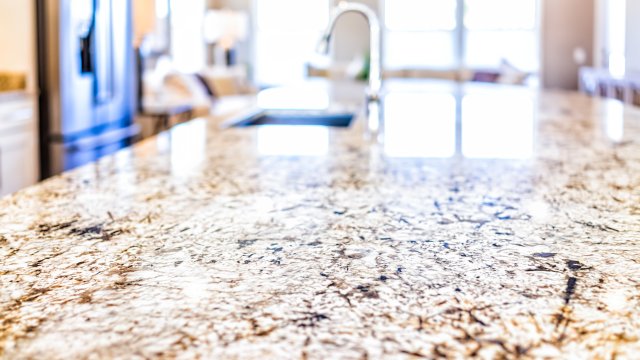 Image of a granite countertop in a kitchen. 