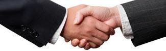 Two people shaking hands to indicate partnerhip