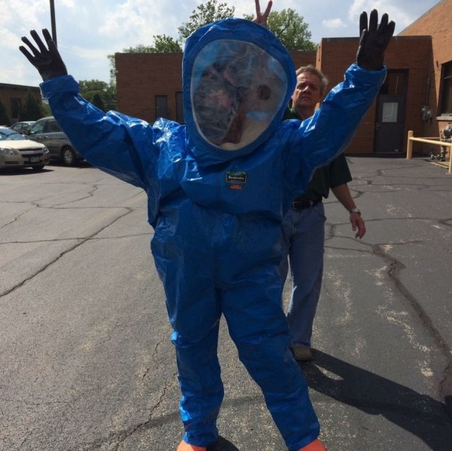 Dr. Taft training in a full Level A Personal Protective Equipment suit.