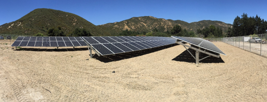 Solar panels in front of California Hills
