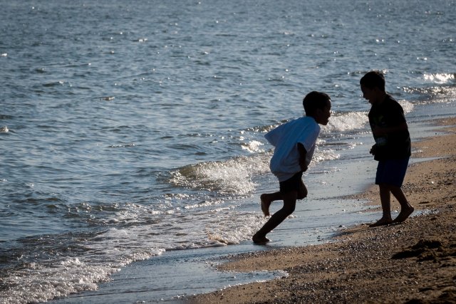 Children playing on beach.