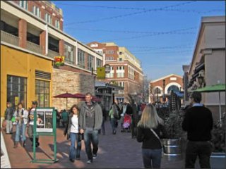Image shows people on a pedestrian-only street in Atlantic Station, Georgia. 