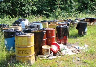 Chemical drum at contaminated site