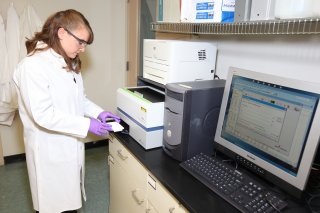 EPA scientist performing HTT testing