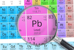 Close up through a magnifying glass of Lead from the periodic table