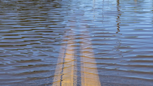 Street partially submerged in floodwater