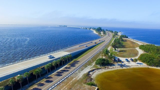Aerial view of Sanibel Causeway with the shoreline visible