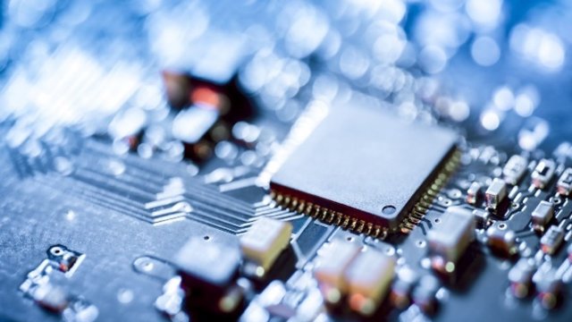 A close-up view of a circuit board and associated electronic components