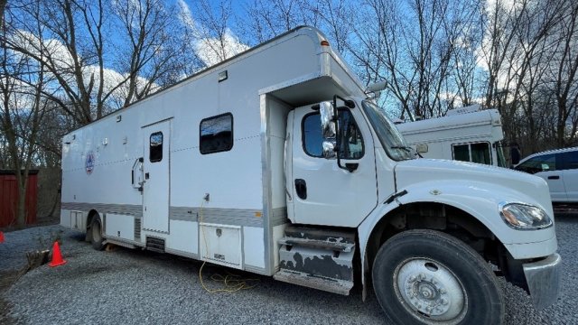 Truck that resembles an RV. Large enough to walk inside.