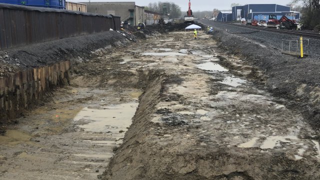 Muddy pit during excavation on north tracks