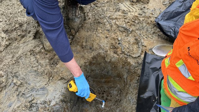 Handheld monitors are used to screen VOC levels in excavated areas