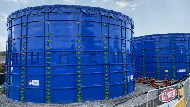 The large blue tanks where contaminated liquids are being staged.