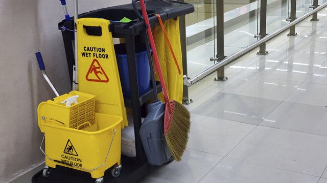 Janitor cart with cleaning supplies