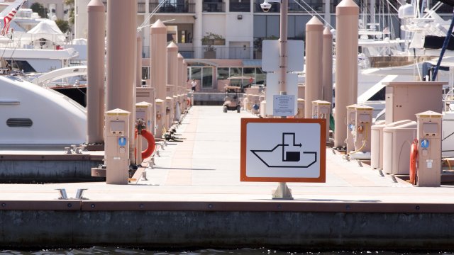 Vessel sewage pumpout sign in a marina