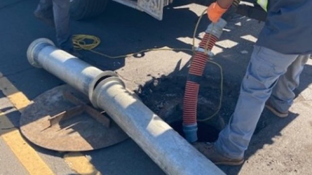 Workers inspecting sewer lines on Maui