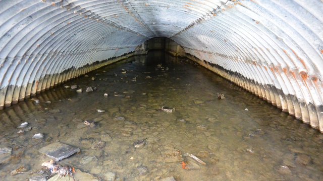 The culvert underneath Liberty Street where cleaning operations are ongoing but weather dependent