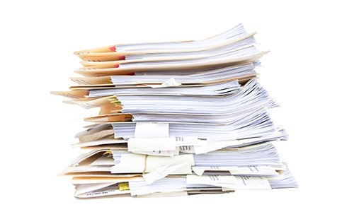 Photo of a stack of papers and folders
