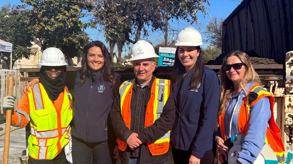 Regional Administrator Martha Guzman (second from left) with California Department of Toxic Substances Control’s Mehdi Bettahar, Supervisor Janice Hahn’s representative Katie Butler, and members of Workers for Environmental Restoration in Communities crew, at a residential property cleanup near the former Exide battery recycling facility.