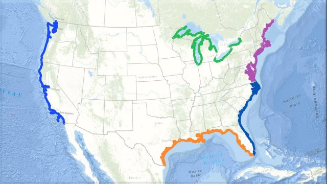 Map of the continental United States showing the west coat, gulf coast, southeast, and northeast coastal areas outlined as well as the Great Lake  coastal areas.