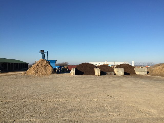 Wide shot of several piles of compost at Virginia Department of Corrections.