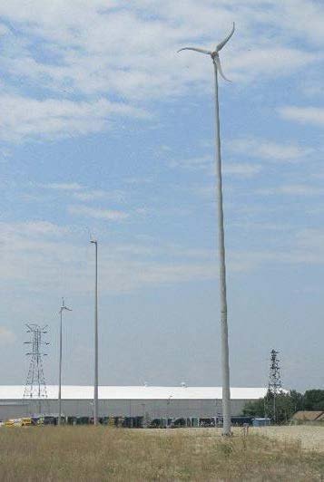 Photograph of three wind turbines on tall towers
