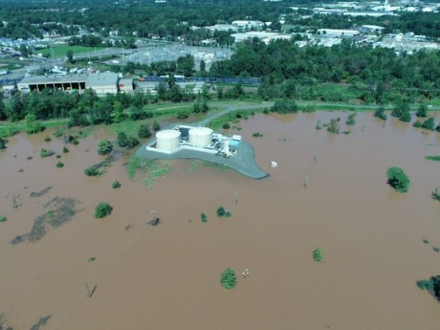 Aerial photograph showing widespread flooding of the site.