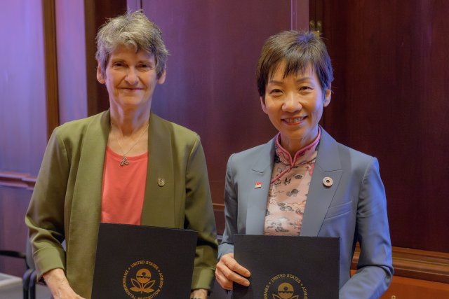Deputy Administrator McCabe and Singapore Minister Grace Fu Holding Signed MOU