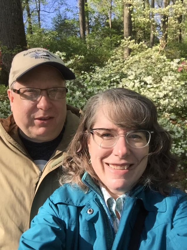 man and woman selfie smiling in nature