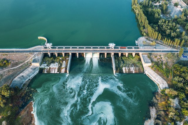 Areal image showing dam spanning a river