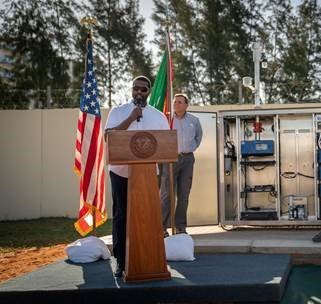 Administrator Regan celebrates the inauguration of the embassy’s new air quality monitor in Maputo, Mozambique