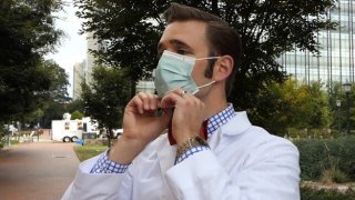 EPA researcher wearing a surgical mask.