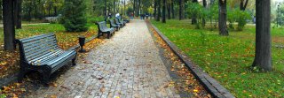 Stock image of benches in a city park