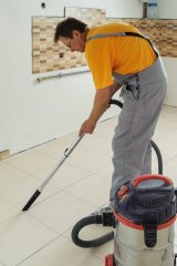 Person vacuuming