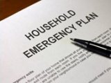 Household emergency plan list with pen
