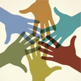 Colorful image of hands reaching together in a circle 