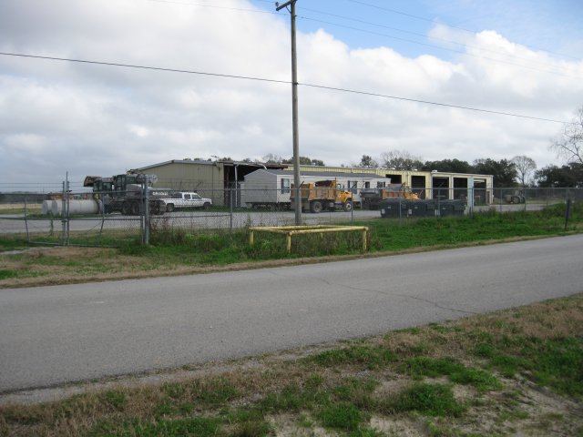 The fenced area north of the limestone road is being used by the Vermilion Parish Police Jury as a vehicle maintenance area