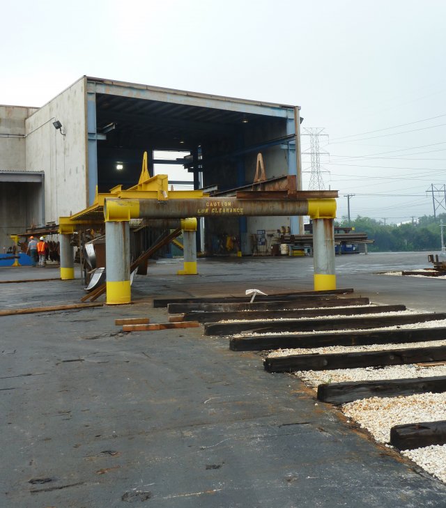 The steel part loading area and warehouse on the site