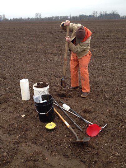 Biologist Blake Hatteberg installs a lysimeter