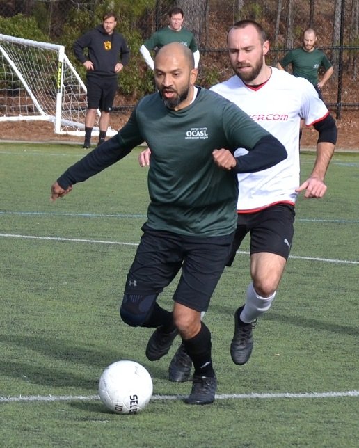 Mehdi Hazari playing soccer. 