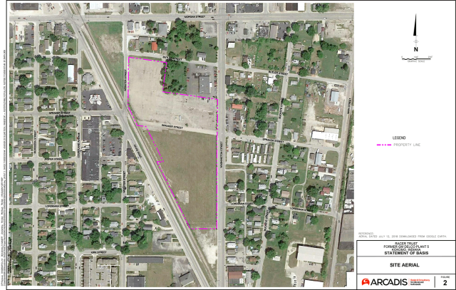 figure of The site is a vacant 10.5-acre parcel of property with a parking lot located on the north side, as outlined. The property immediately to the south, the small triangle shaped property, is the former Midwest Plating Superfund site