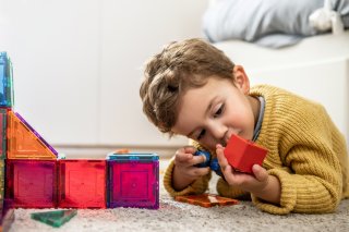 boy playing with blocks