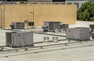 HVAC equipment on rooftop of a commercial building