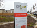 Signage for the Filmore Gardens NORA Green Pilot Rain Garden Program.