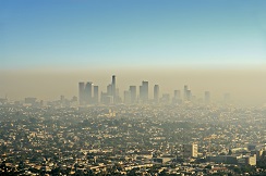 smog obscures a city panorama  