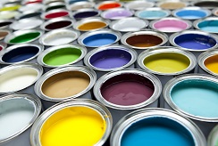 Rows of open paint cans in various colors