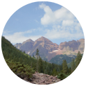Circle icon for Program Progress section showing a distant mountain