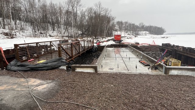 Work continues on the pedestrian bridge at Wire Mill Pond.